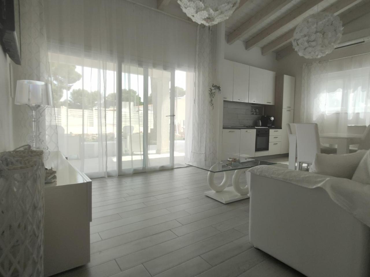 Ikebana Villas Porto Pino Beach Exterior photo