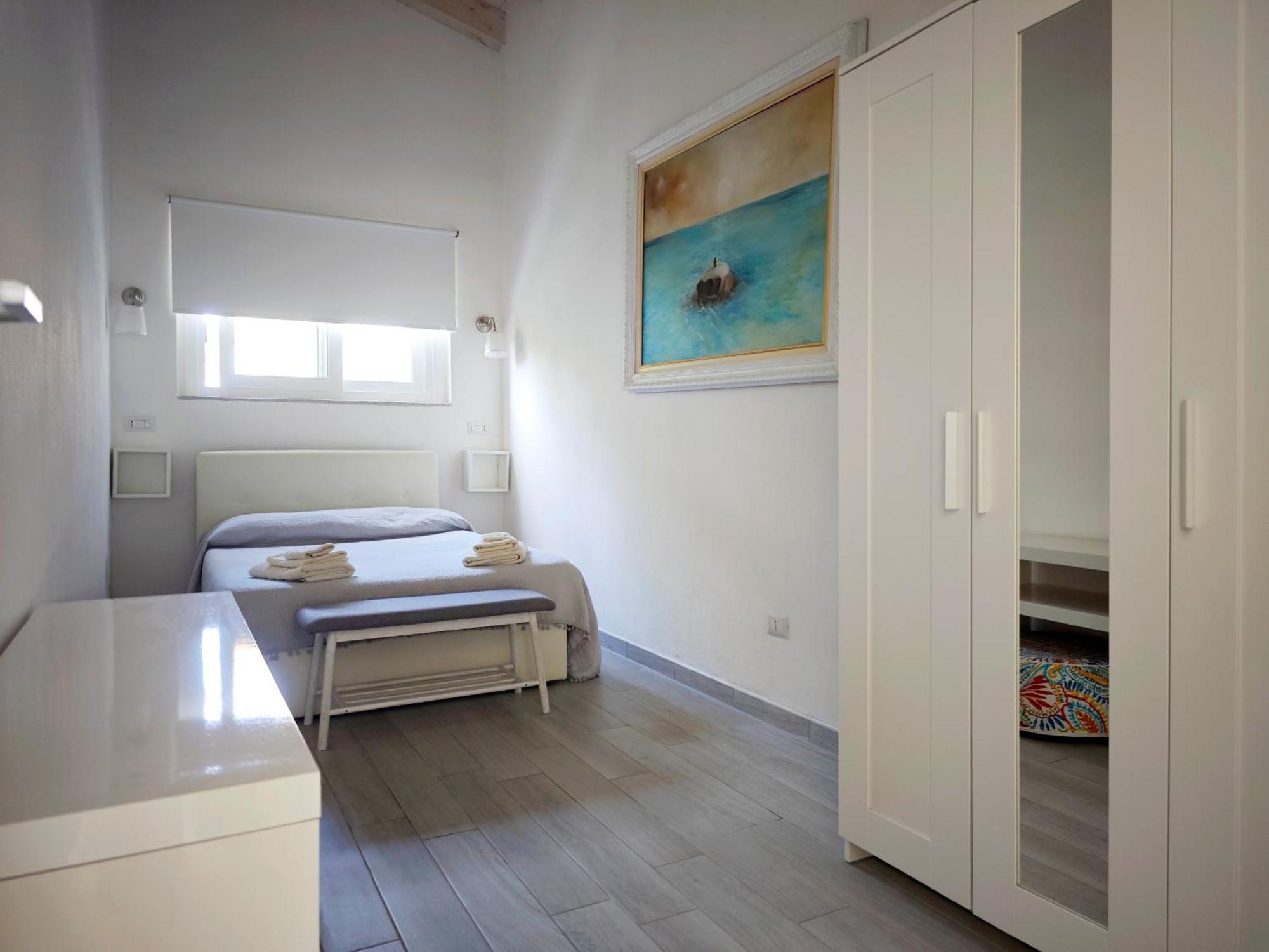 Ikebana Villas Porto Pino Beach Exterior photo