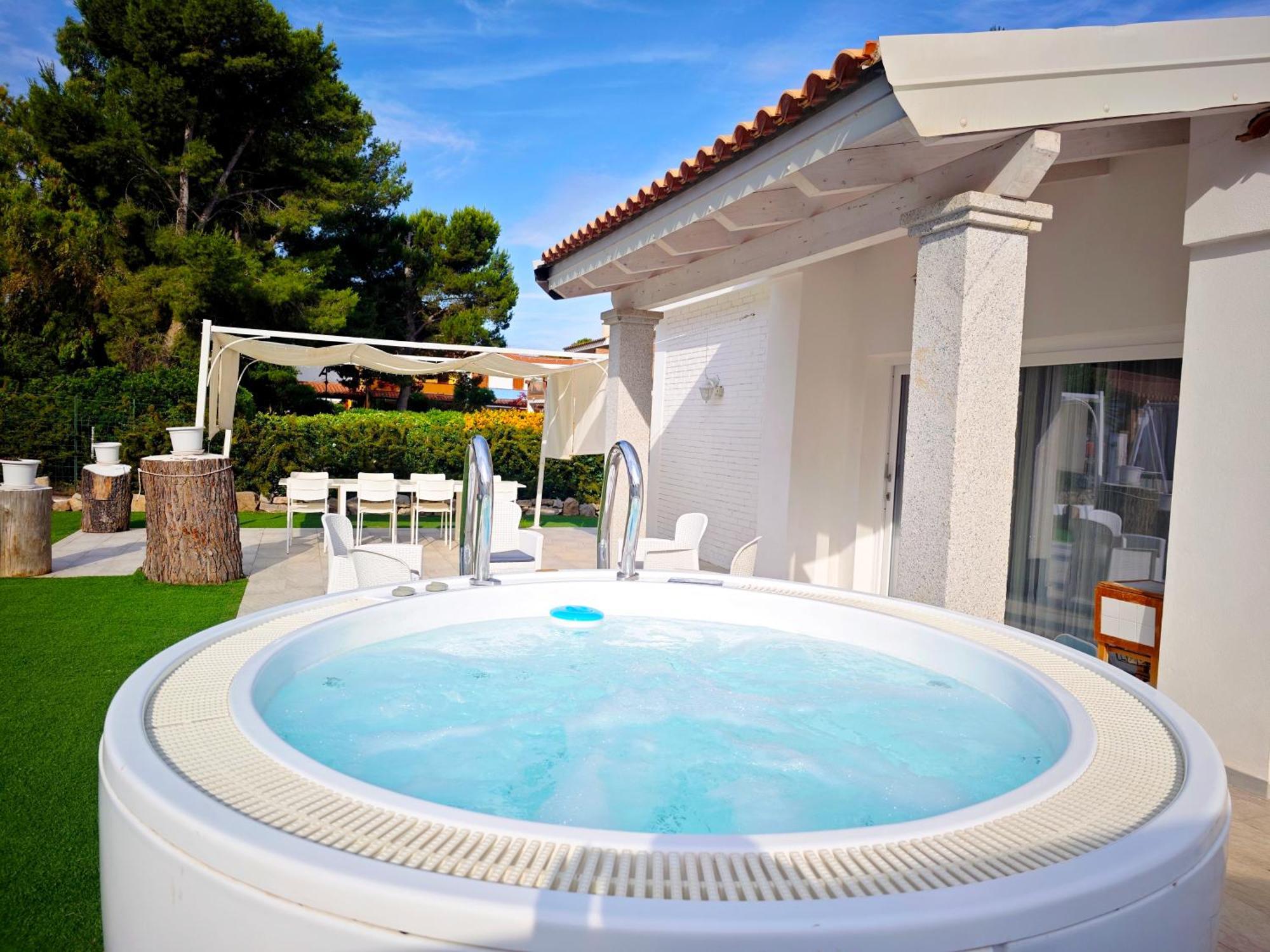 Ikebana Villas Porto Pino Beach Exterior photo